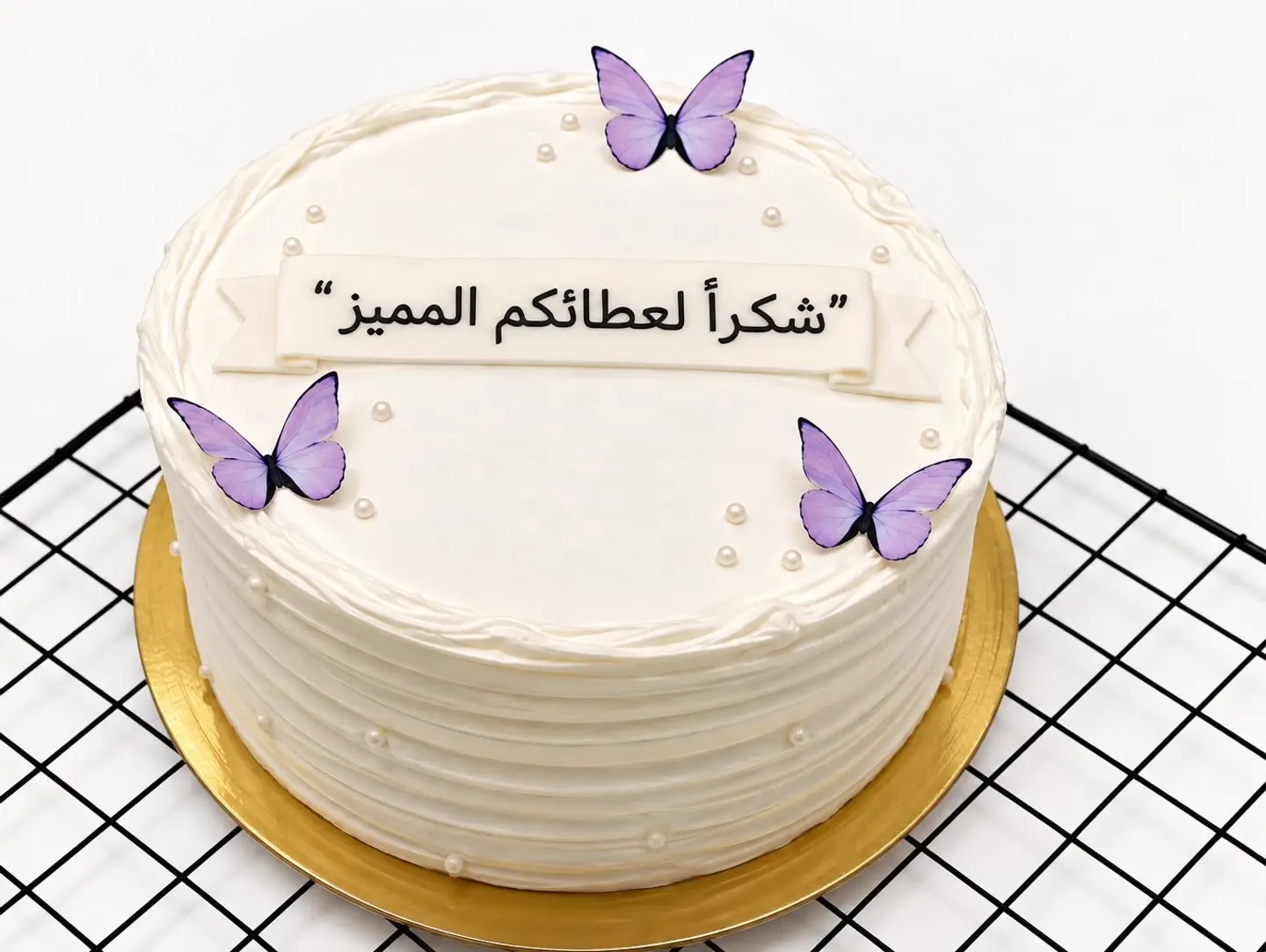 كيك يوم المعلم فراشات ٨ انش