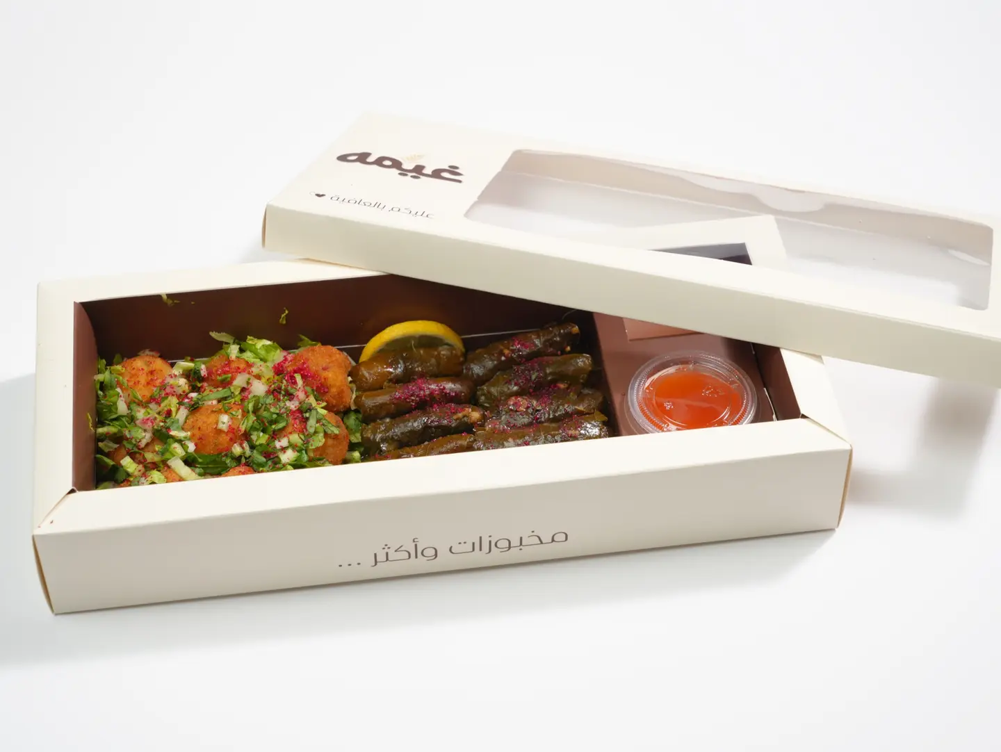 Potato Kibbeh   Stuffed Grape Leaves