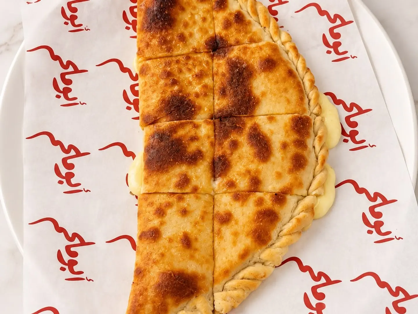 منقوشة جبنة سائلة