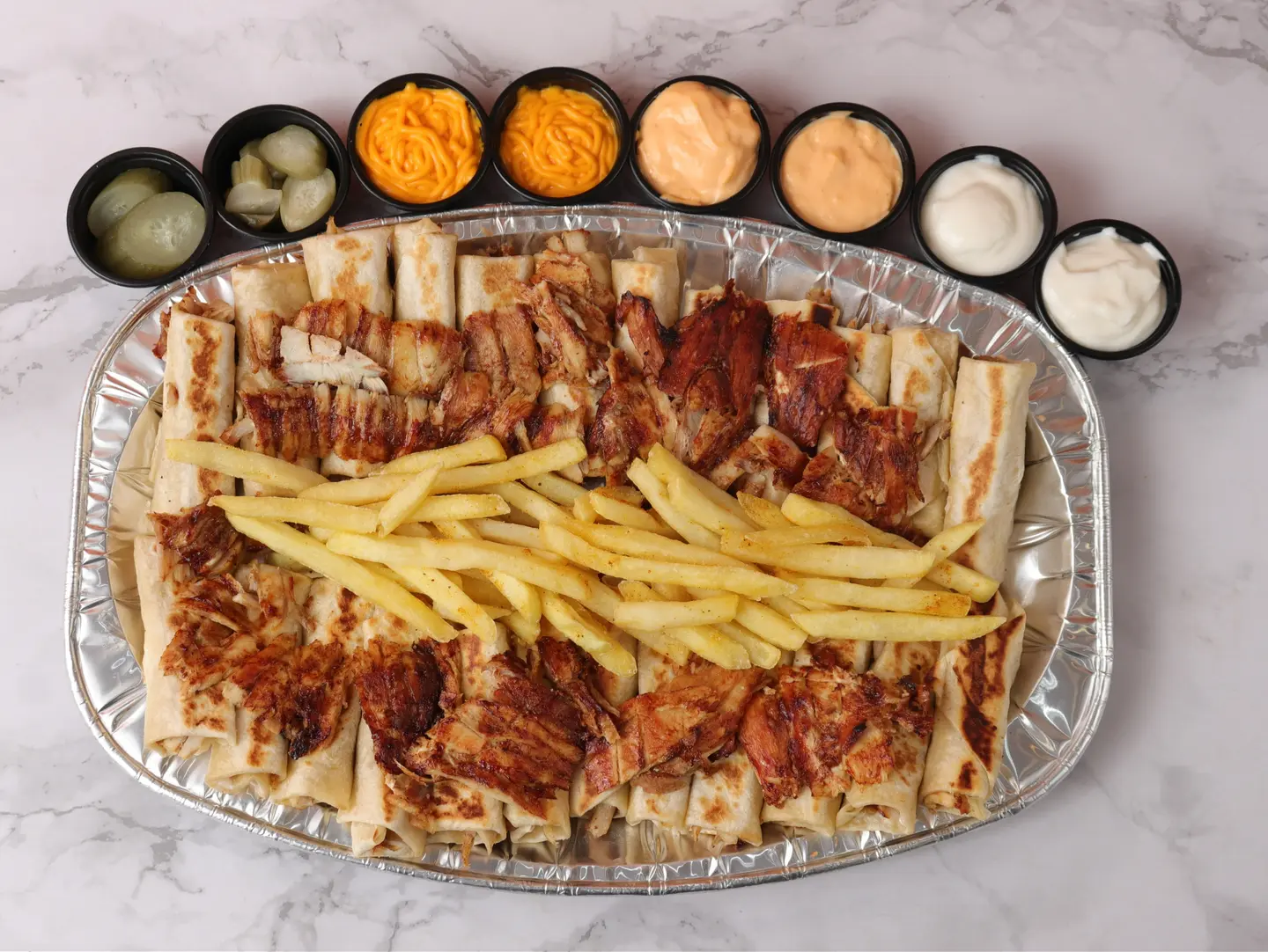 Large Family Platter: 24 Shawarma Fingers With Fries And Sauces.