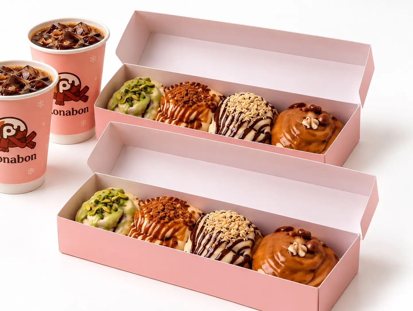 2 Mini Cinnabon Boxes + 2 Coffee Of The Day