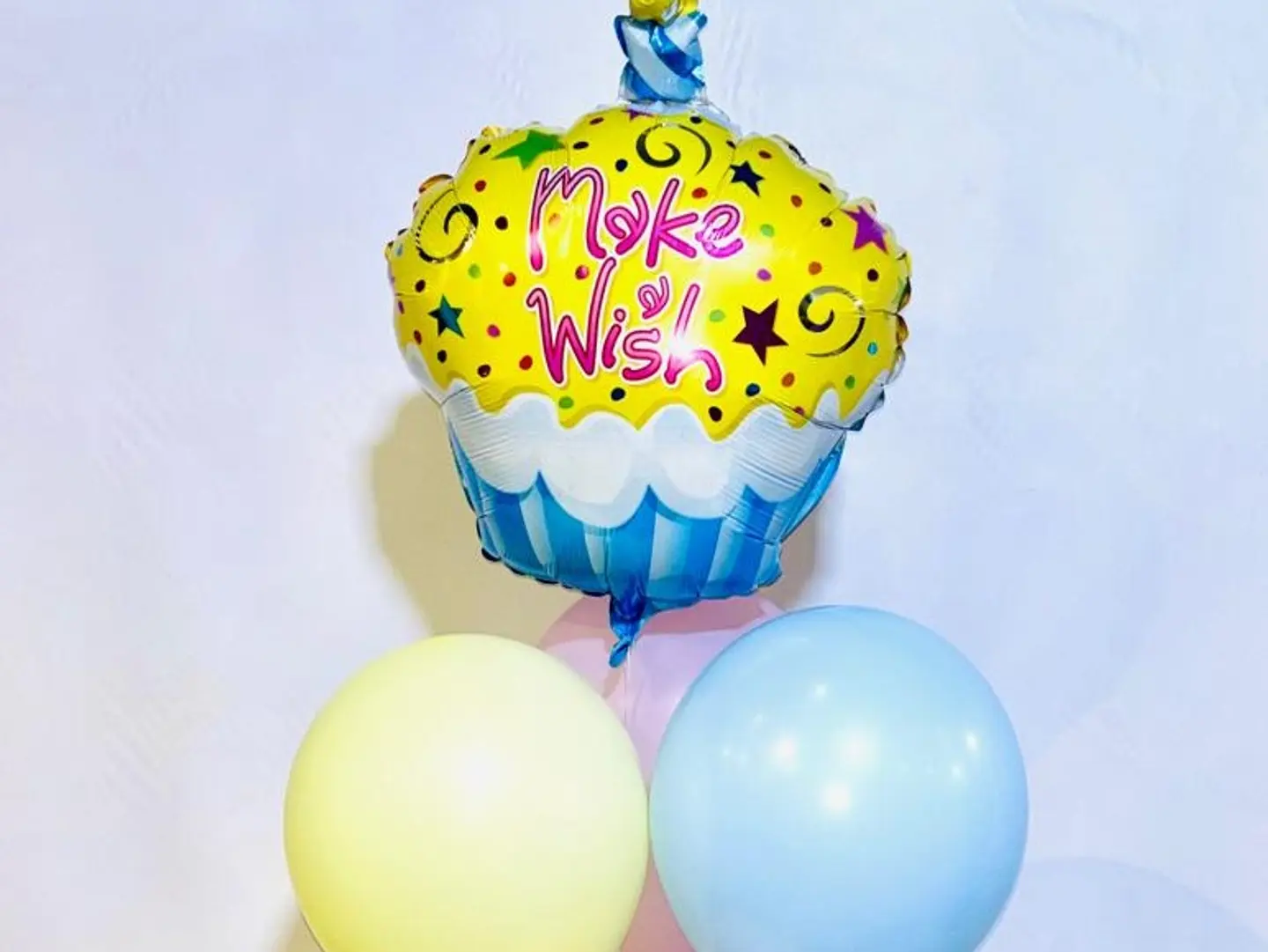 A Bouquet Of Cupcake Shaped Balloons
