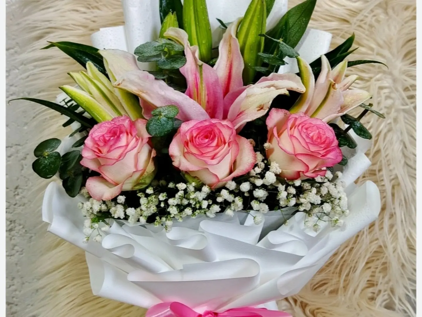 A Large And Luxurious Bouquet Filled With Elegant Lilies