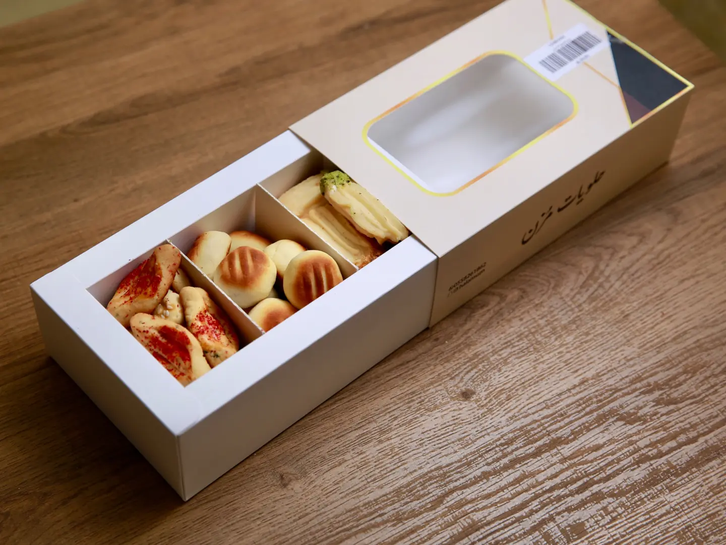 A Small Box Of Maamoul, Petit Fours, And Savory Snacks.