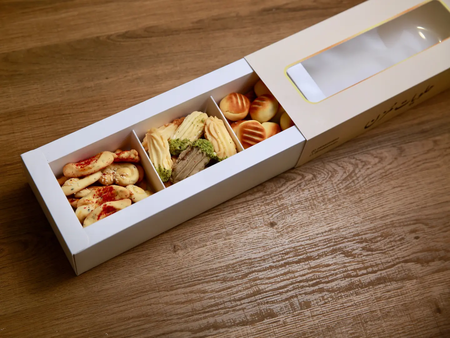 A Large Box Of Maamoul, Petit Fours, And Savory Snacks.