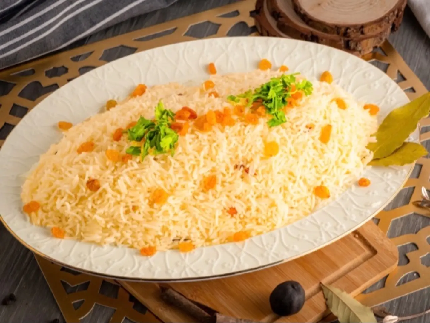 A Plate Of Plain Rice With Walnuts And Parsley.