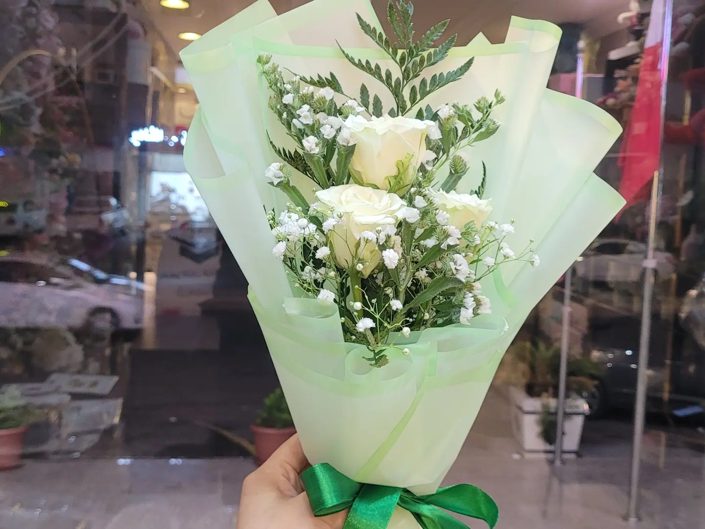 National Day Bouquet With Two Helium Balloons One White And One Green.