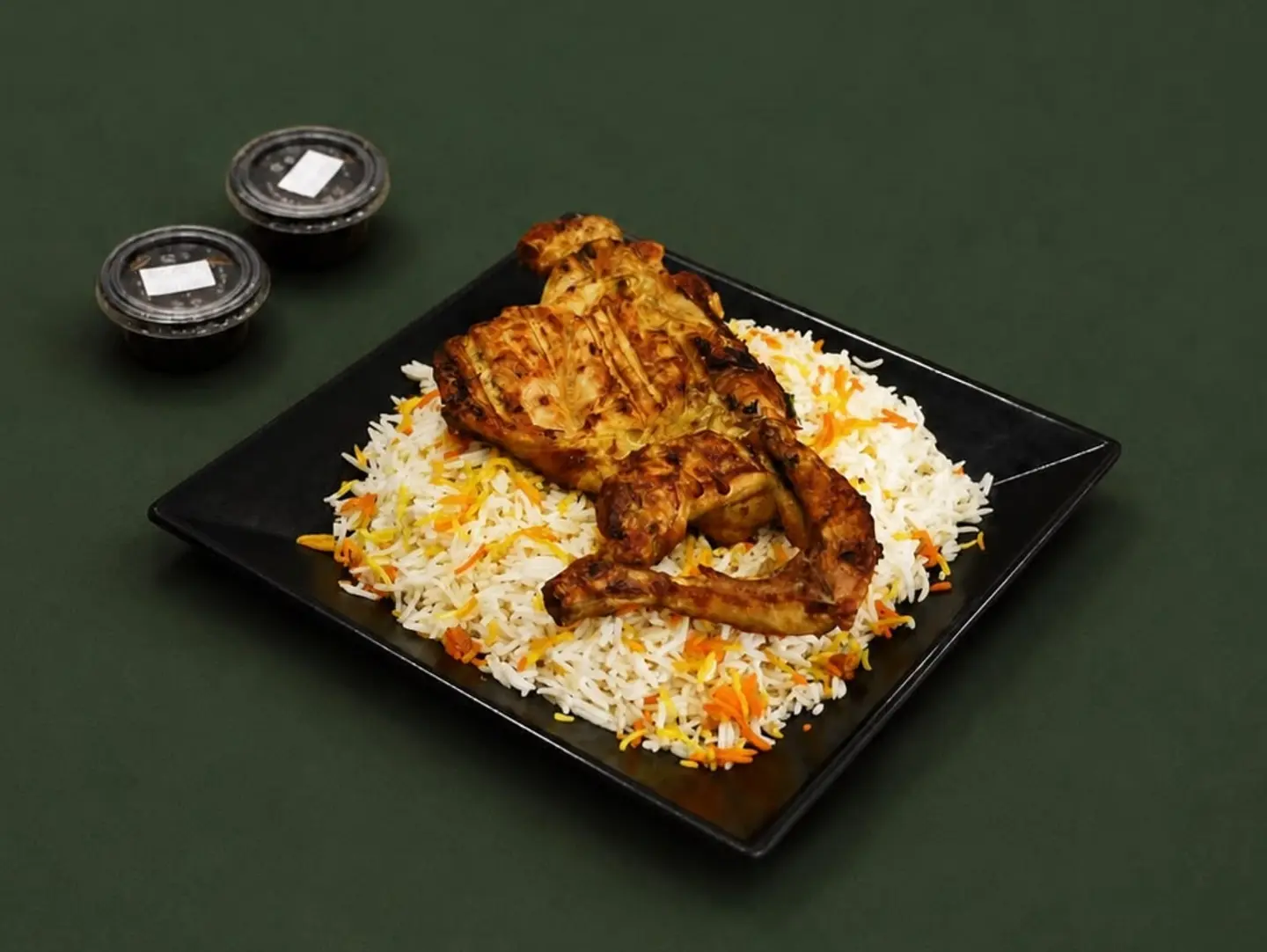 Half A Chicken Grilled With White Biryani Rice.