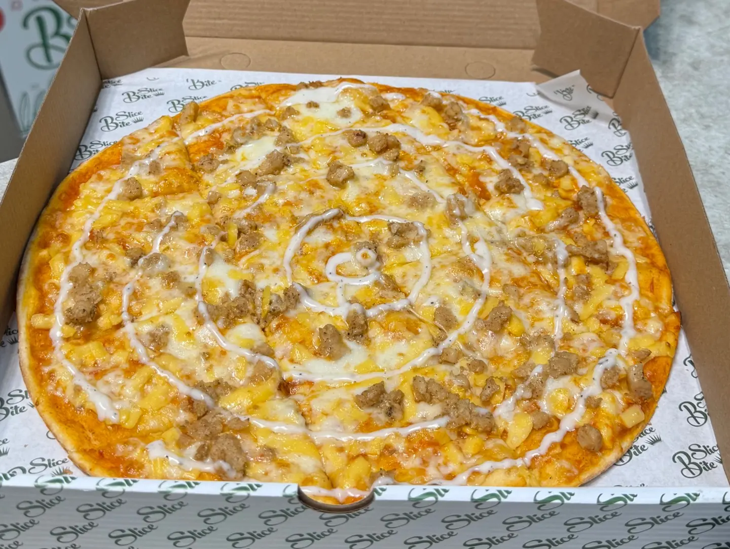 Special Red Sauce With Mozzarella And Cheddar Cheese, Ranch Chicken, And Our Signature Ranch Sauce