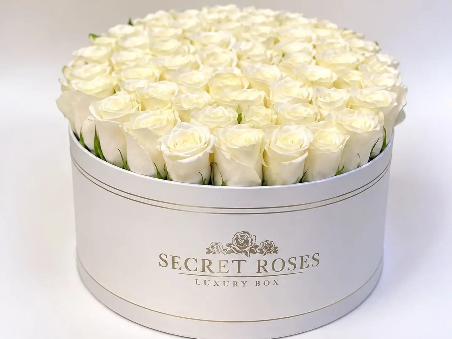 Round Flower Box With White Roses