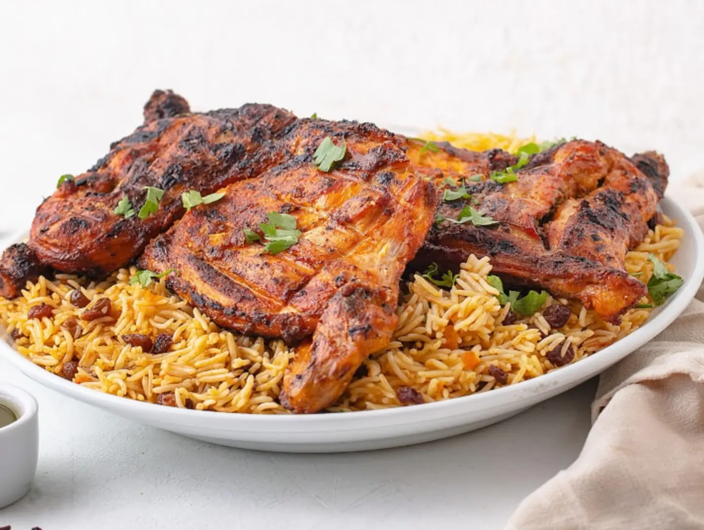 Whole Charcoal Grilled Chicken With Biryani Rice.