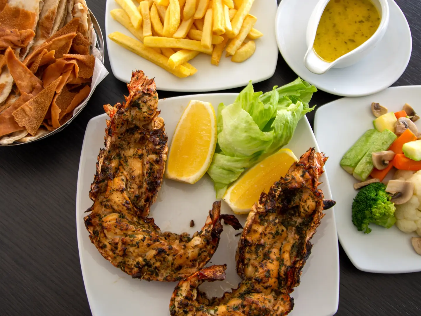 Grilled Lobster With Vegetable Saute & French Fries