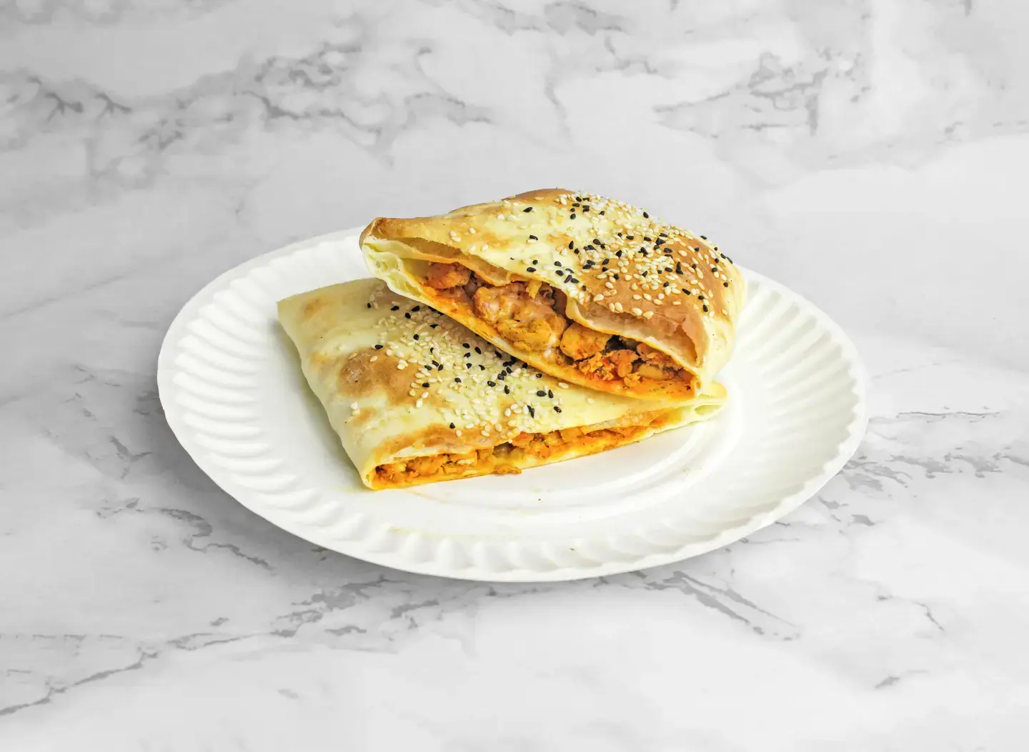Kudu Chicken Sandwich In Round Bread With Cheese