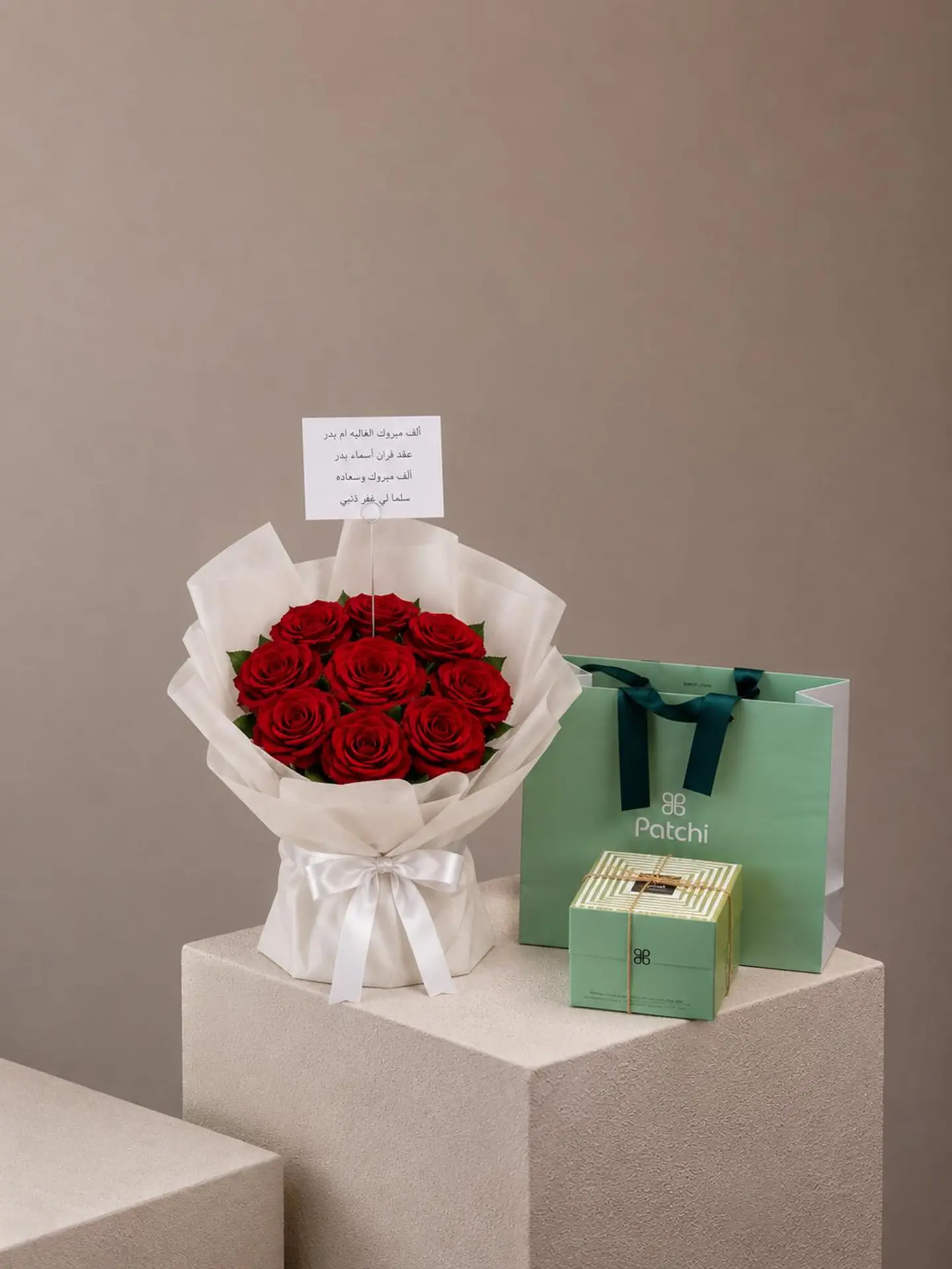 A Bouquet Of Roses And Patchi Chocolates 1
