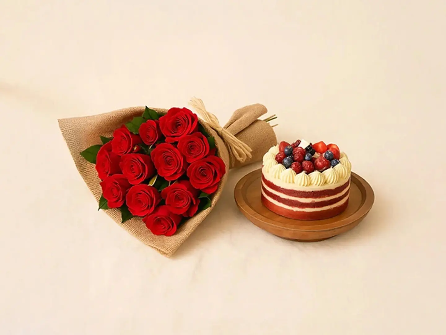 12 Red Roses Bouquet And Half Kg Red Velvet Cake Combo