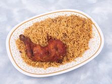 نص حبة دجاج شواية مع رز بخاري