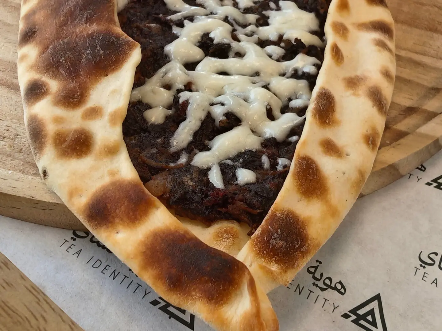 Spinach Manakish With Mozzarella Cheese